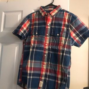 Read why am blue plaid button up shirt